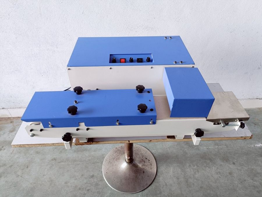 Continuous band sealer machine for packing